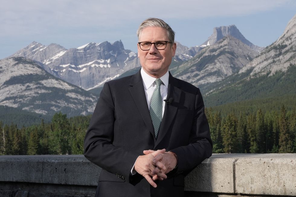 \u200bKeir Starmer look on as he attends media interviews during the G7 summit in Kananaskis, Alberta
