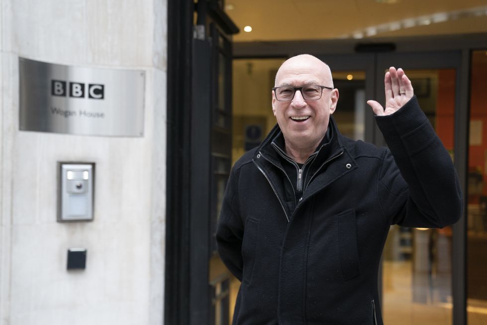 \u200bKen Bruce waving outside the BBC