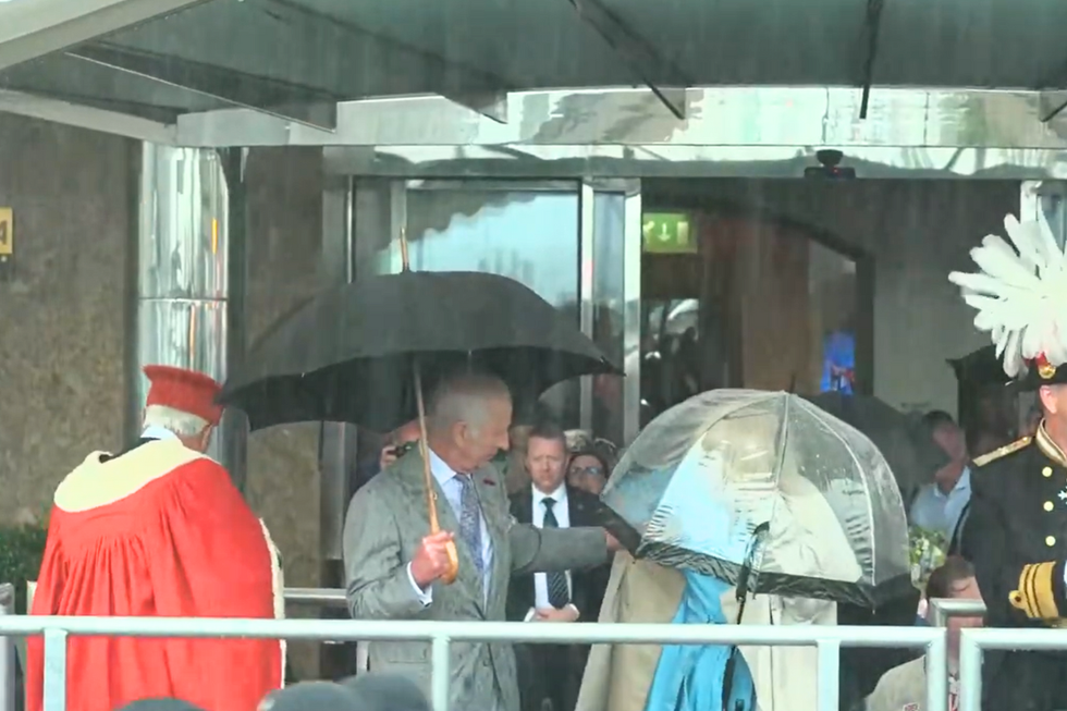 \u200bKing Charles had tried to help Queen Camilla before gesturing to an aide