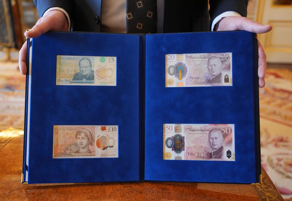 \u200bKing Charles is shown the new bank notes