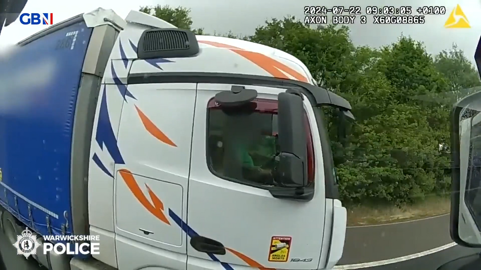 \u200bLorry driver on his phone