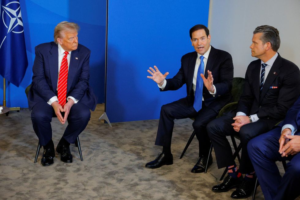 \u200bMarco Rubio speaks next to US Secretary of Defense Pete Hegseth, as US President Donald Trump