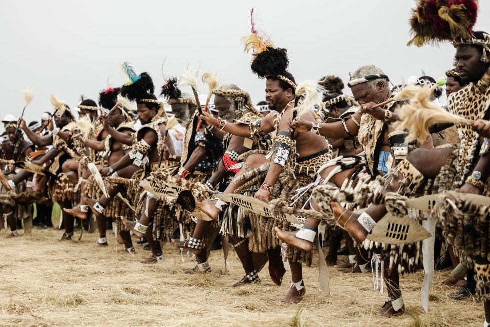 \u200bMen dressed in traditional Zulu attires
