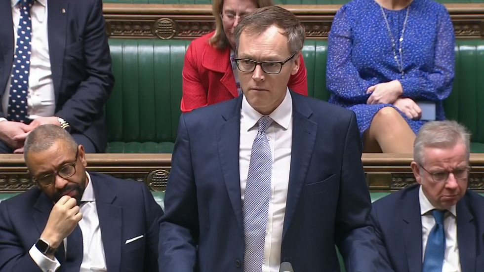 \u200bMichael Tomlinson KC, speaks in the House of Commons during a debate about the migrant crisis