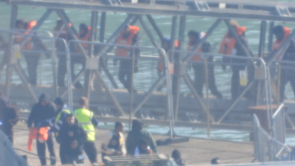 \u200bMigrants arriving on Border Force vessel in Dover