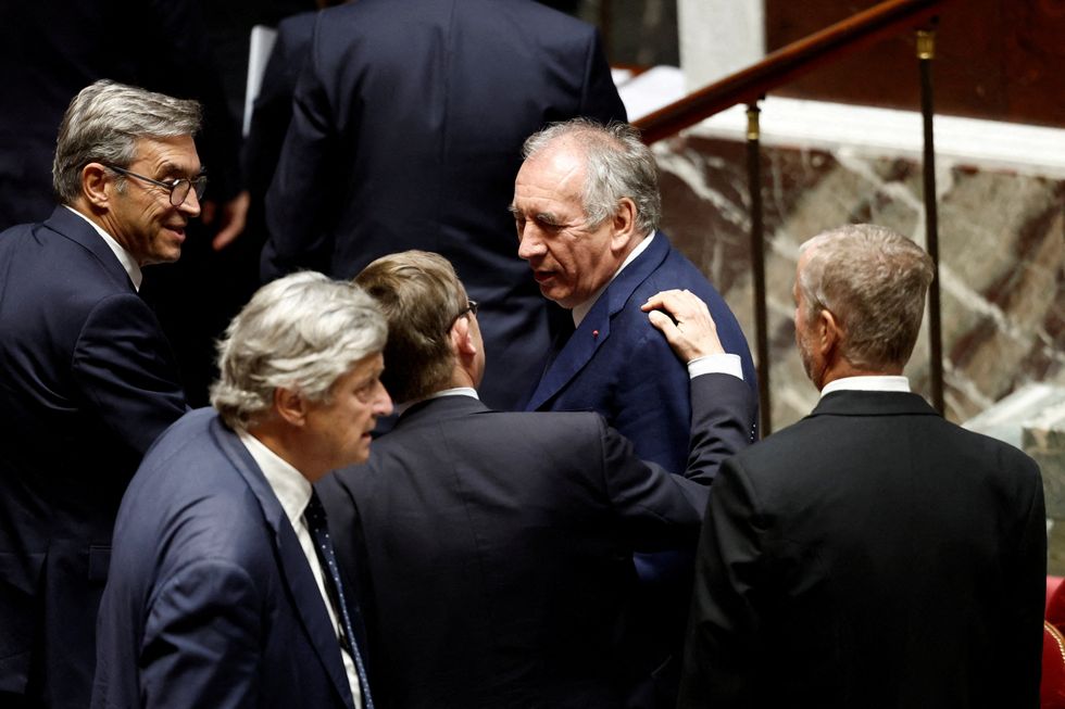 \u200bMr Bayrou seen leaving the French parliament after losing the confidence vote