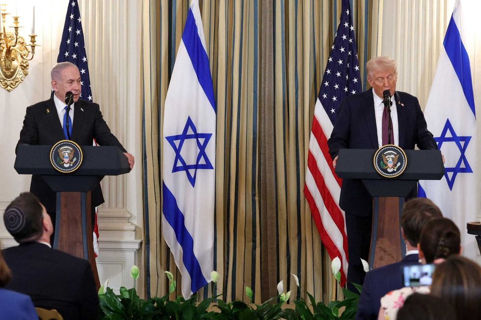 \u200bMr Trump alongside Mr Netanyahu at a press conference