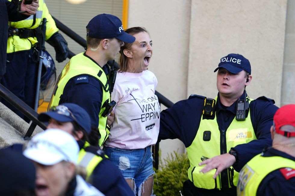 \u200bMs White being detained by Essex Police