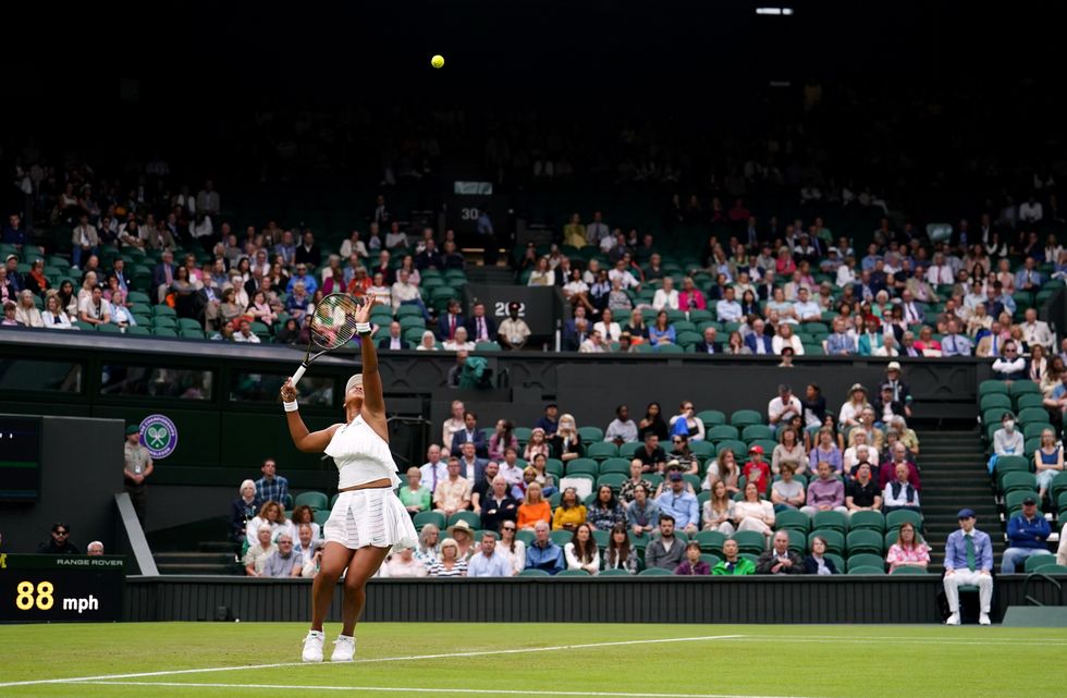 \u200bNaomi Osaka serving during her wimbledon tennis match