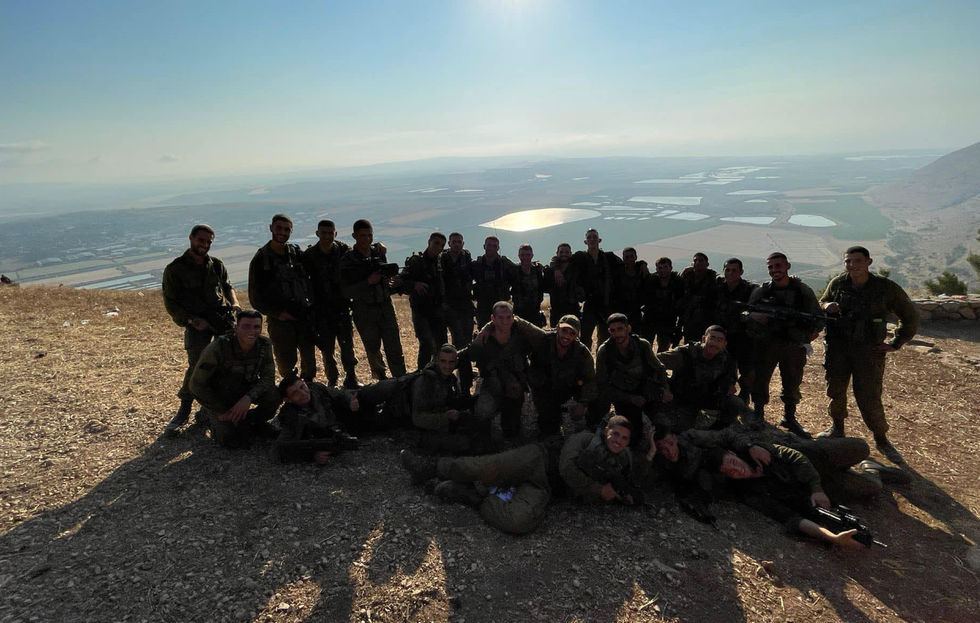 \u200bNathenel posing with fellow soldiers