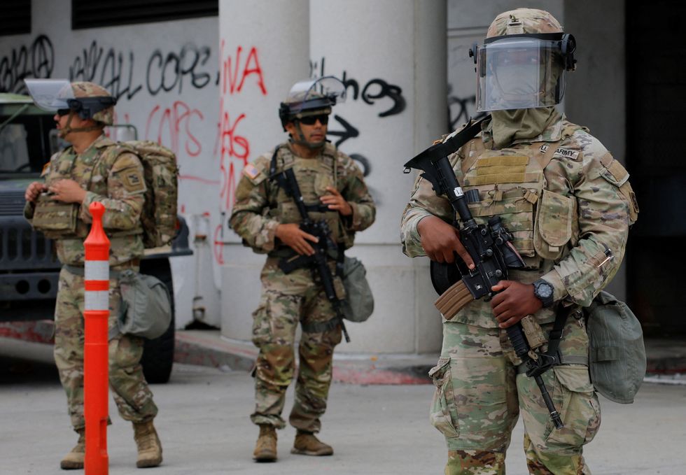 \u200bNational Guard troops poised for action