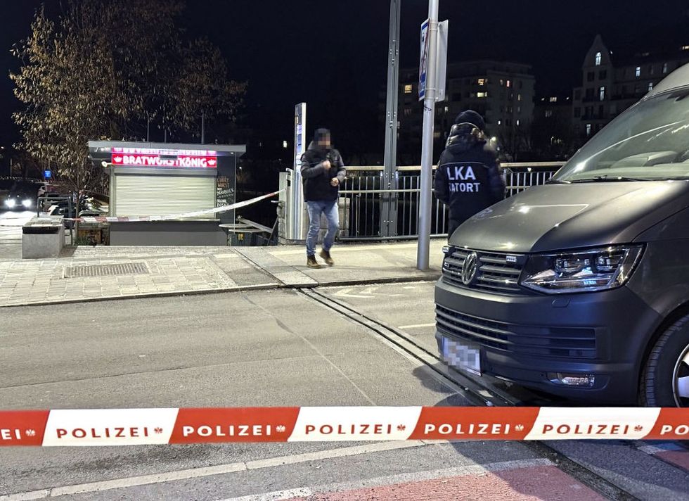 \u200bOfficers of the Austrian State Criminal Police are seen near a police cordon