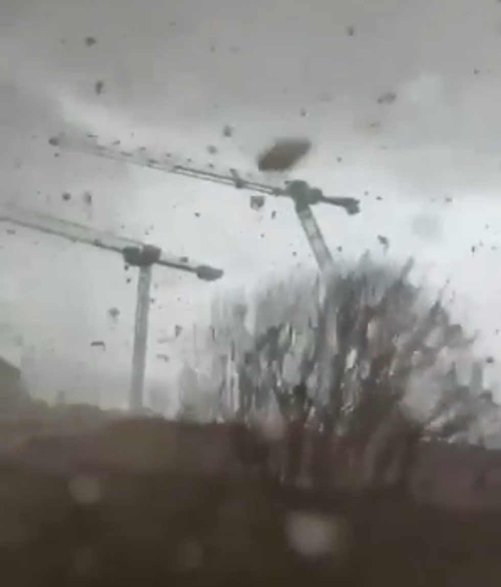 \u200bOne local said: 'It was stormy. And suddenly, I saw an impressive tornado of leaves, and a storm of rain fell on my car'