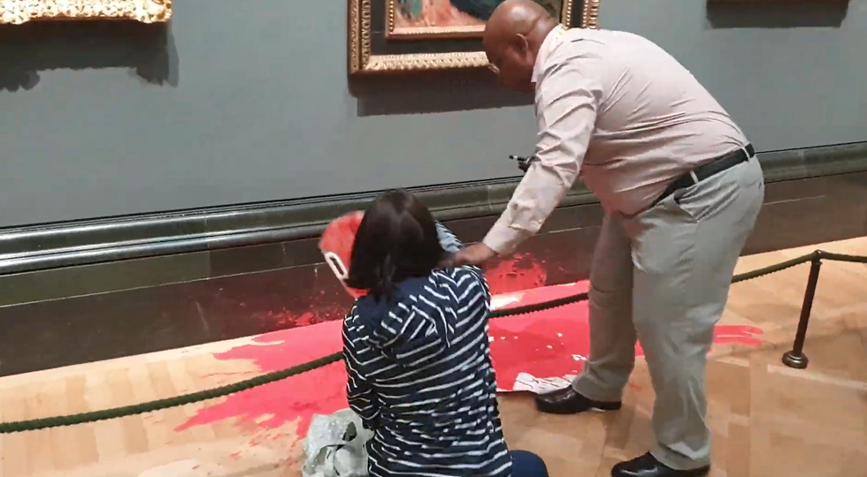 \u200bPaint was poured underneath the painting