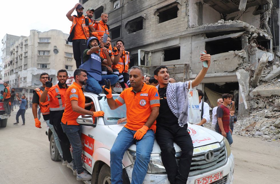 \u200bPalestinian emergency personnel celebrate in Gaza City