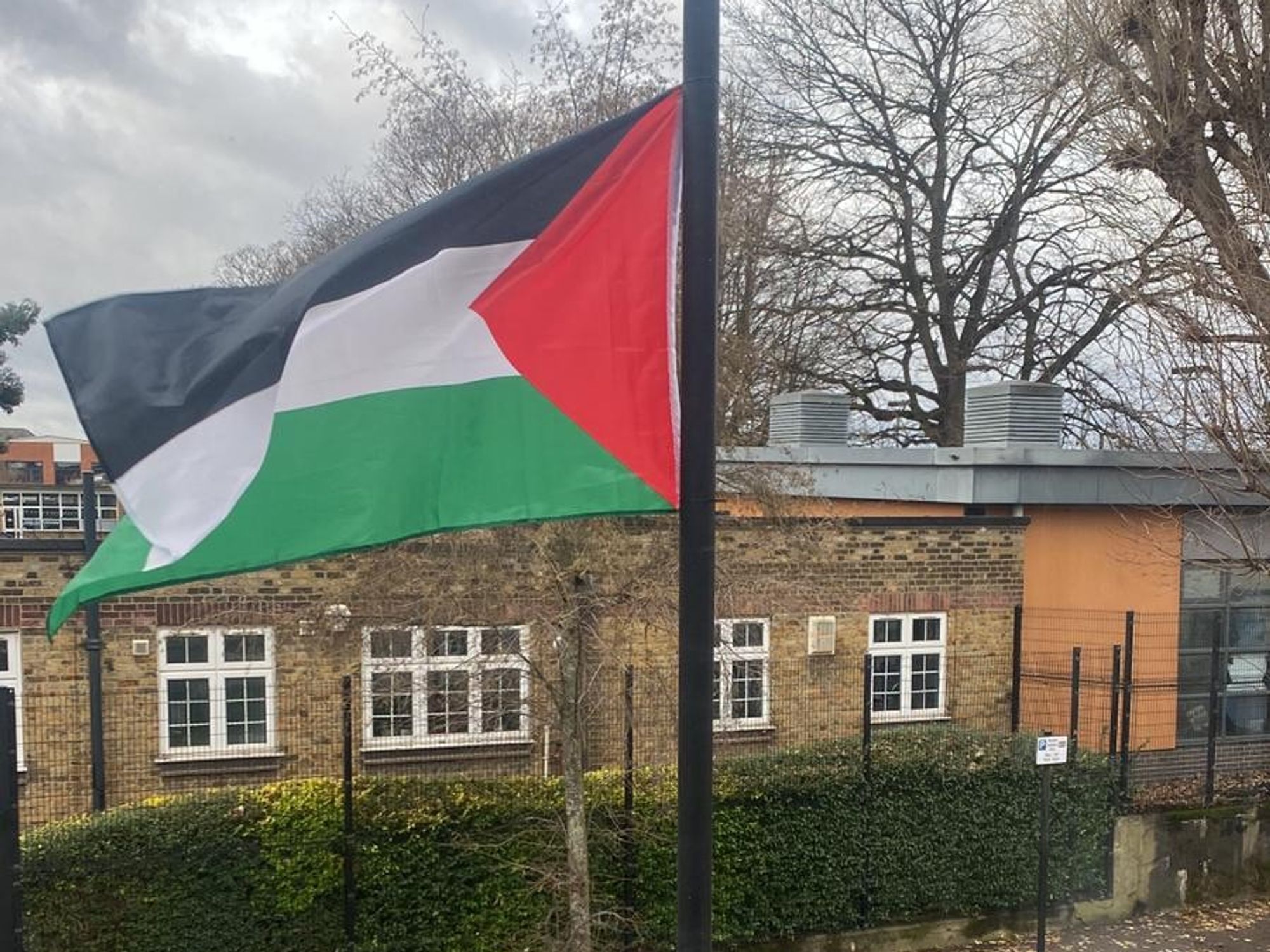 \u200bPalestinian flag hoisted outside school