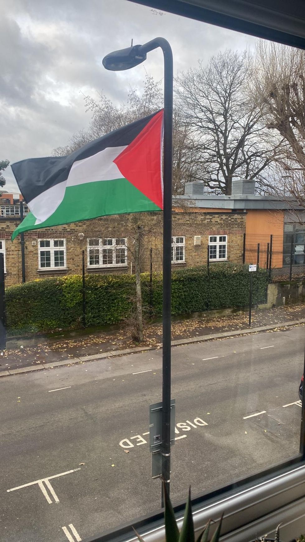 \u200bPalestinian flag hoisted outside school