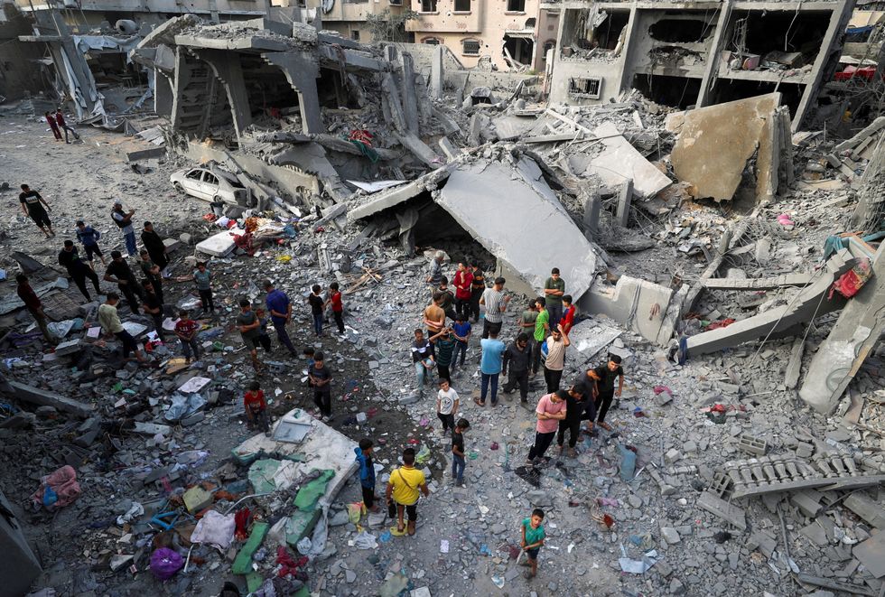 \u200bPalestinians inspect the site of an Israeli strike on a house, in Jabalia, northern Gaza