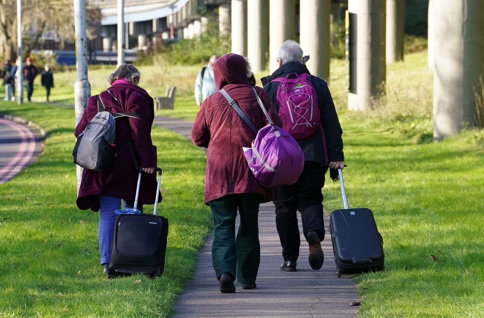 \u200bPassengers at Gatwick airport near Crawley, West Sussex, where flights have been cancelled