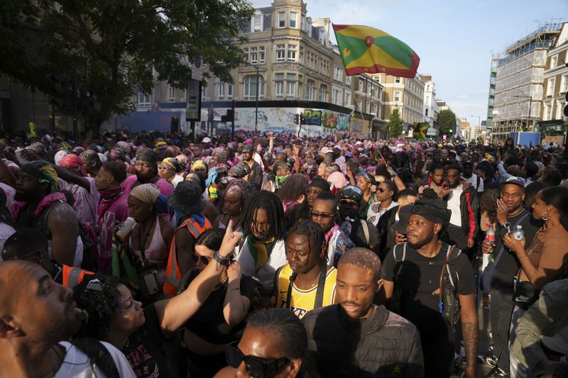 \u200bPeople attending the Children's Day Parade, part of the Notting Hill Carnival celebration