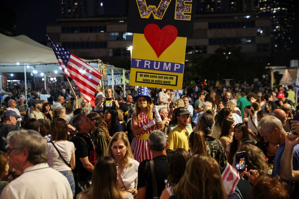 \u200bPeople celebrate at the "Hostages square