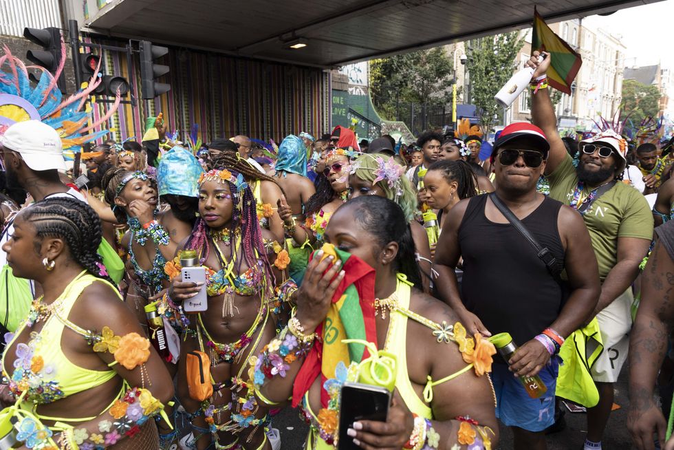 \u200bPeople during the Notting Hill Carnival celebration