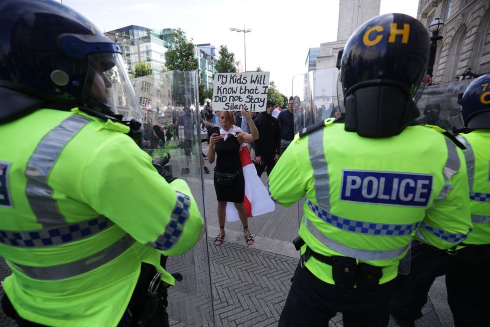 \u200bPeople protest in Liverpool, following the stabbing attacks on Monday in Southport