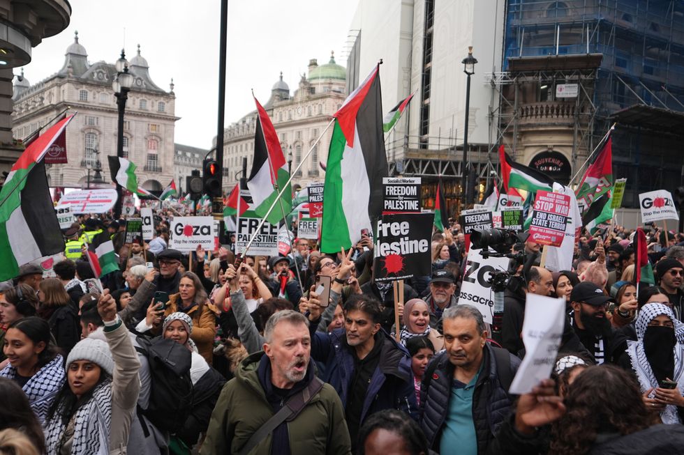 \u200bPeople take part in a Palestine Solidarity Campaign rally in central London