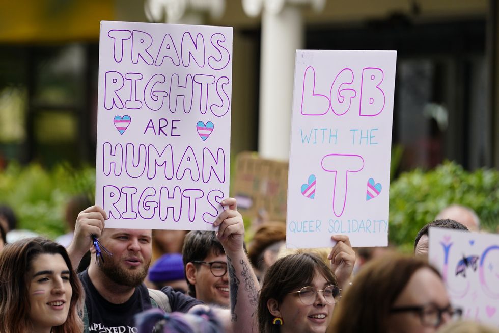 \u200bPeople take part in a Trans Pride protest march in Brighton