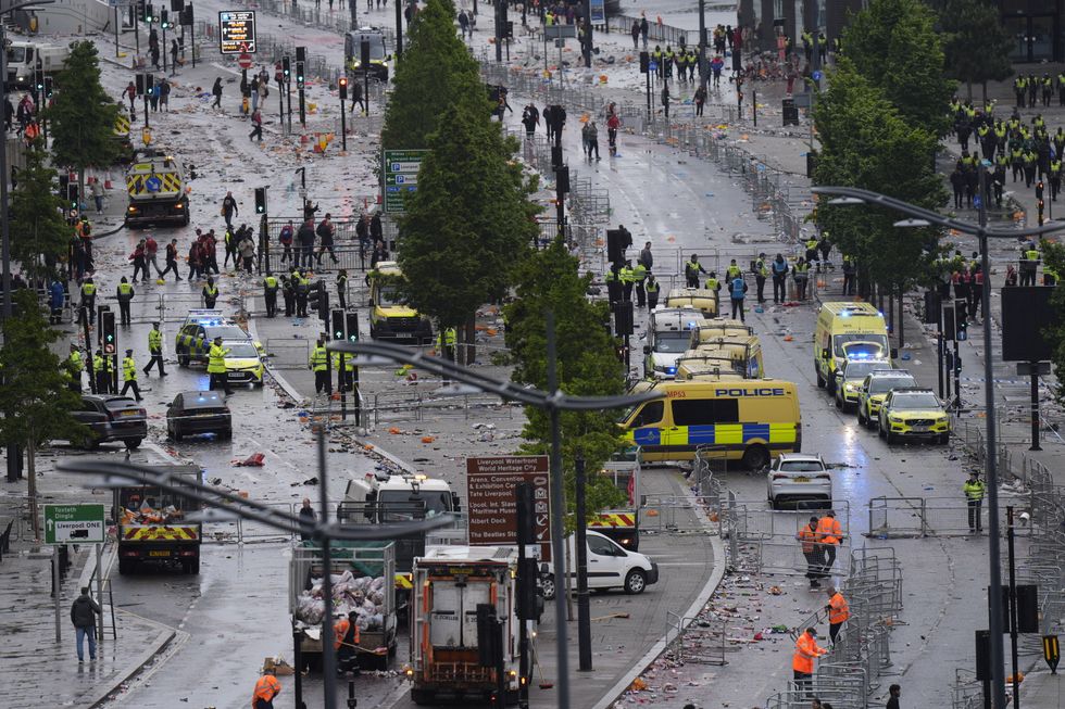 \u200bPolice and emergency personnel dealing with a road traffic accident on Water Street near the Liver Building in Liverpool