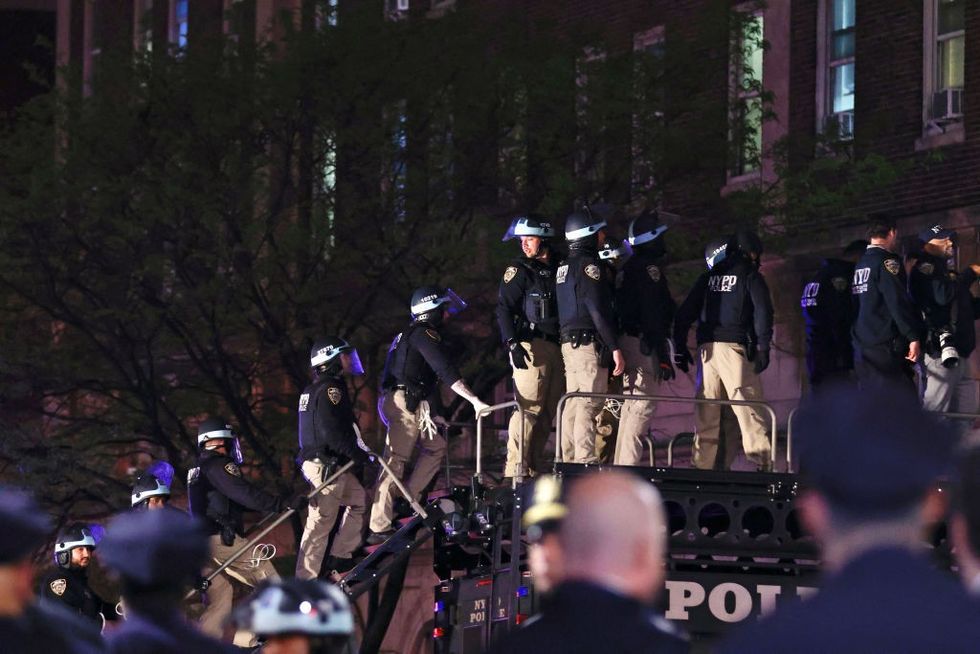 \u200bPolice entering the university