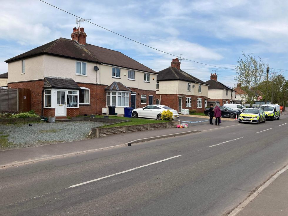 \u200bPolice officers at the scene in Madeley last year