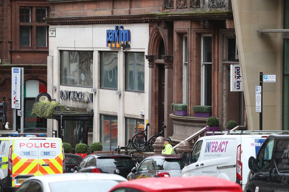 \u200bPolice officers at the scene in West George Street, Glasgow