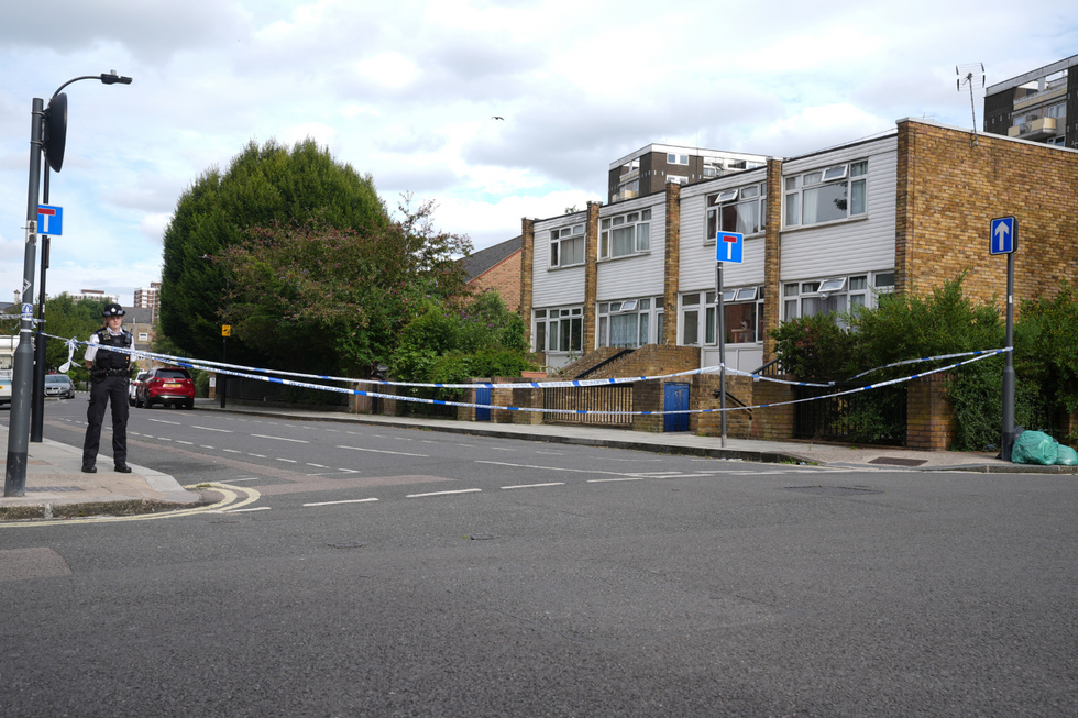 \u200bPolice officers at the scene in West London