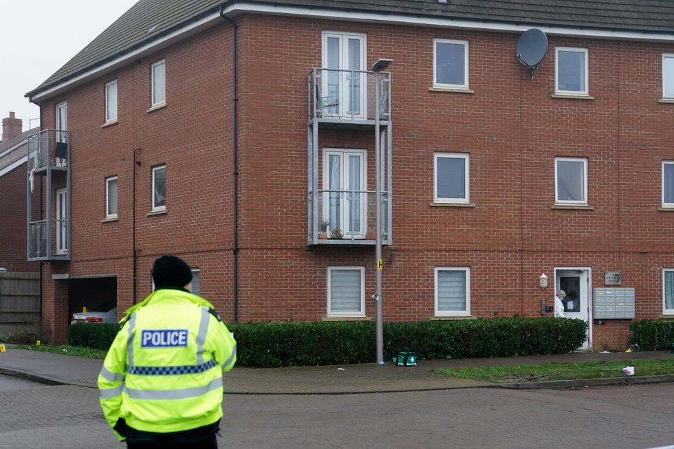 \u200bPolice officers at the scene near an apartment block on Santa Cruz Avenue in Newton Leys, near Bletchley
