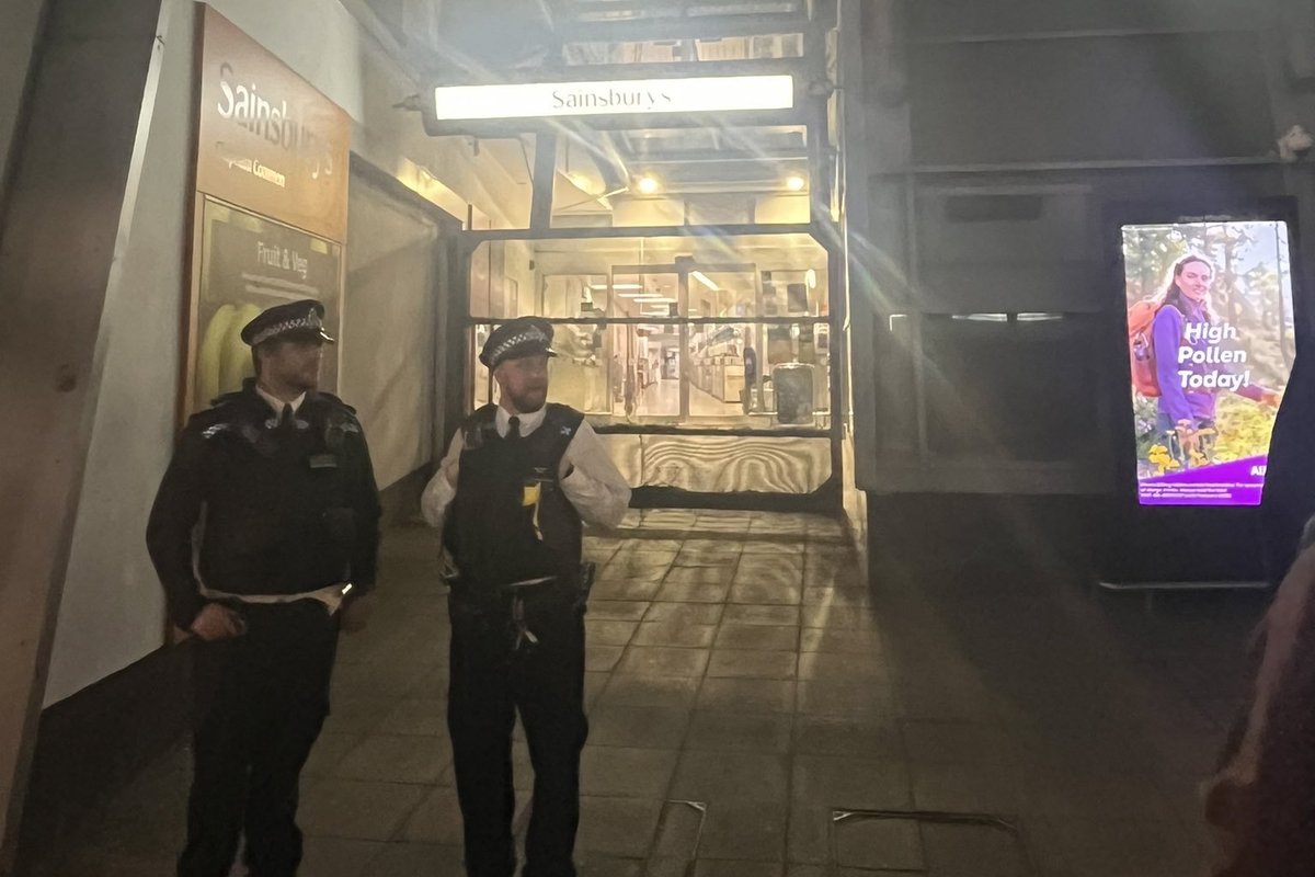 \u200bPolice officers remain at the scene in Clapham