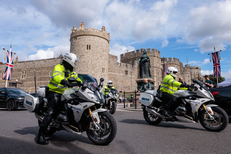 \u200bPolice outriders outside Windsor Castle in advance of the State Visit of US President Donald Trump in September 2025