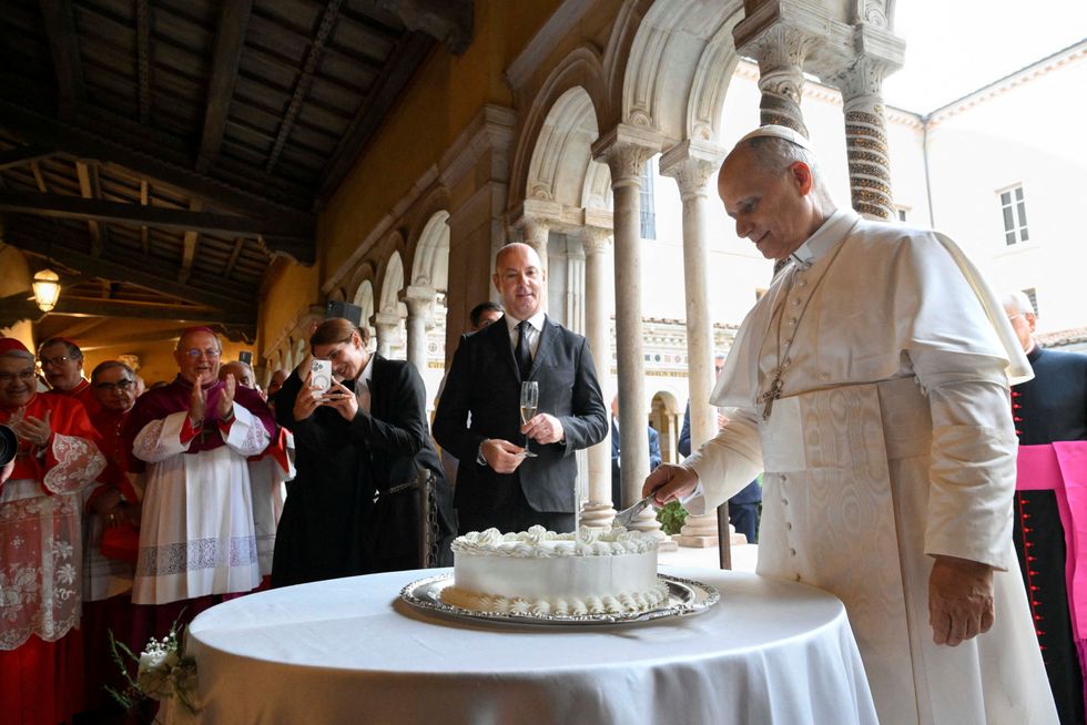 \u200bPope Leo cuts a cake as he marks his 70th birthday