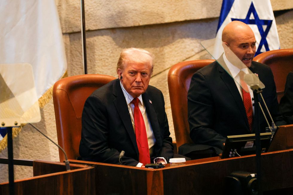 \u200bPresident Donald Trump looks on during an address to the Israeli parliament