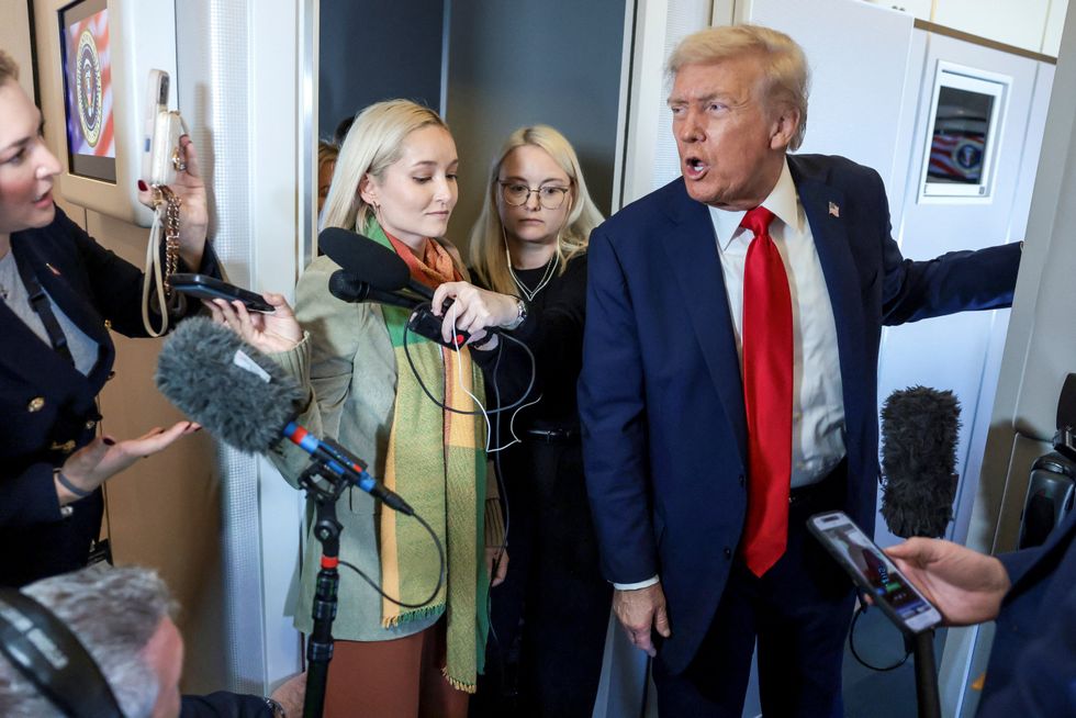 \u200bPresident Donald Trump speaks to the media aboard Air Force One,