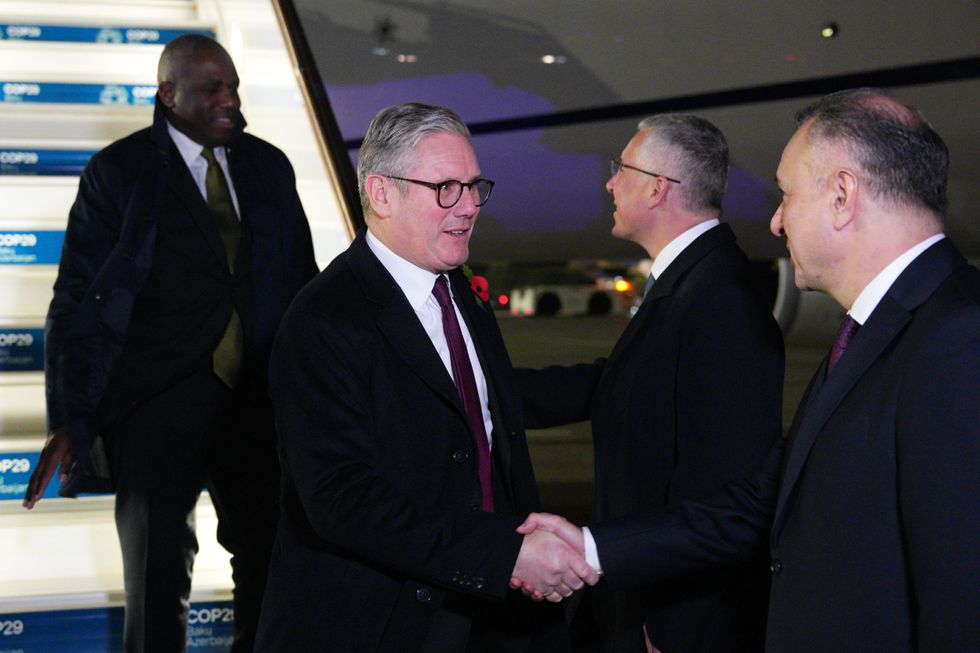 \u200bPrime Minister Sir Keir Starmer and Foreign Secretary David Lammy arrive at Heydar Aliyev International Airport
