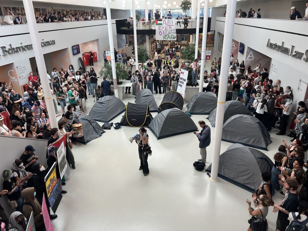 \u200bPro-Palestinian demonstrators gather at the Roeterseiland campus in Amsterdam