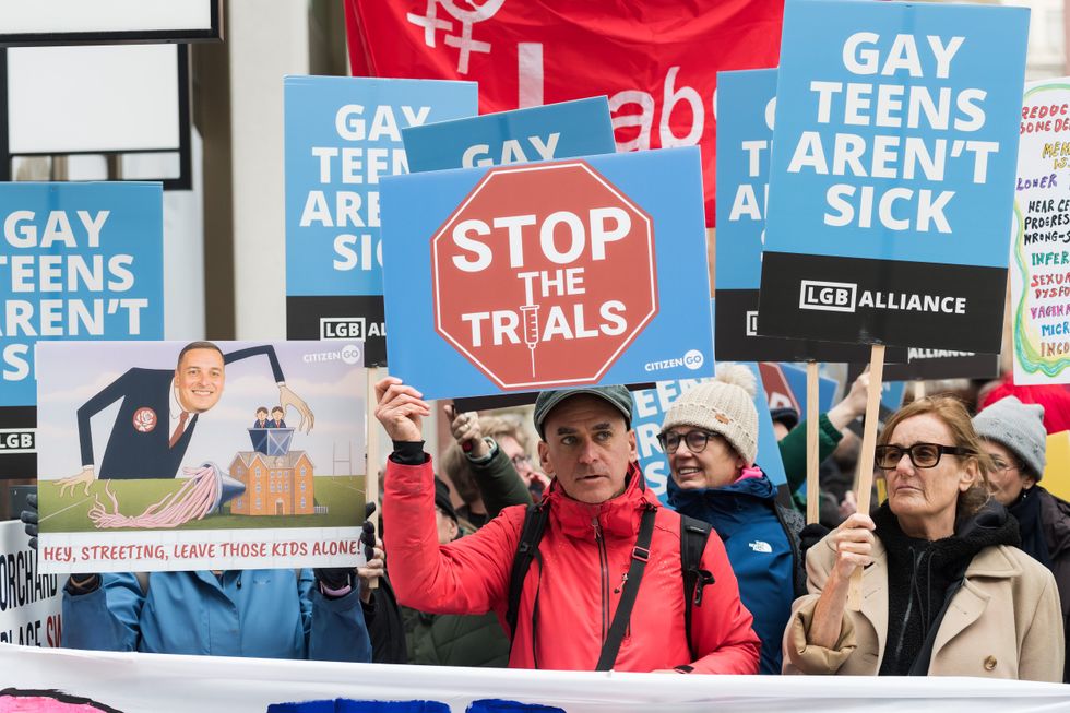 \u200bProtesters gathered outside the Department of Health and Social Care against the puberty blocker trial on December 17 last year