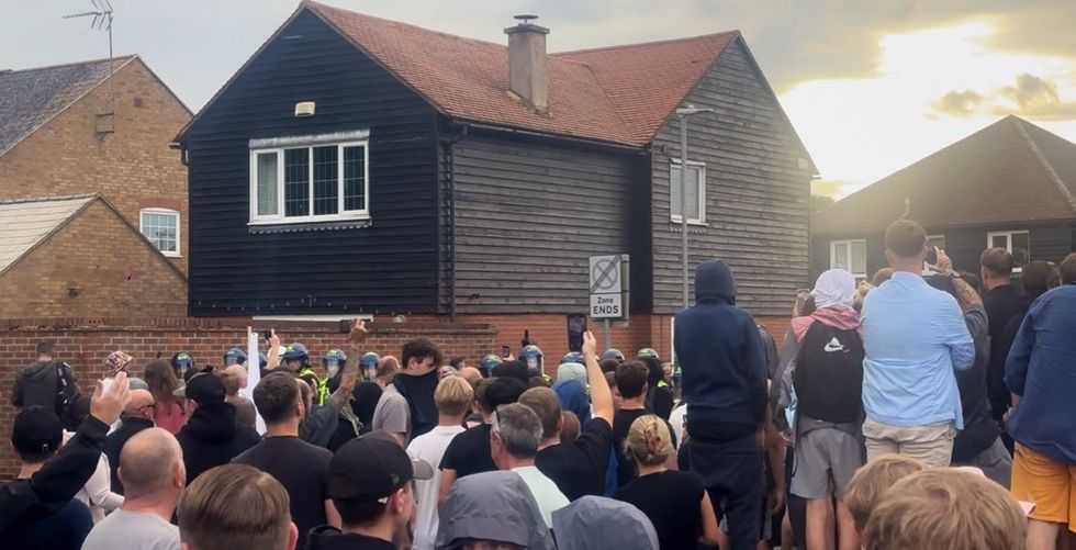 \u200bProtesters gathered outside the hotel last night