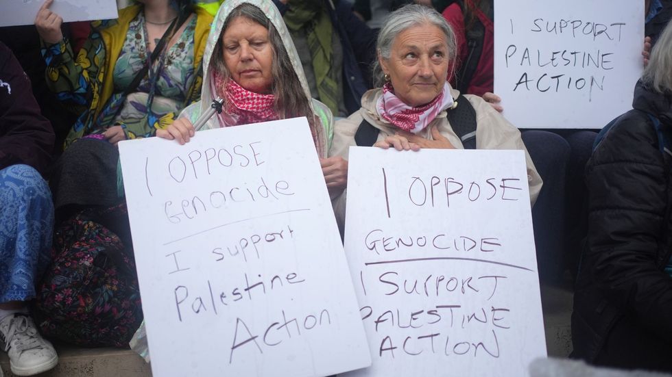 \u200bProtesters held placards stating: 'I oppose genocide, I support Palestine Action'