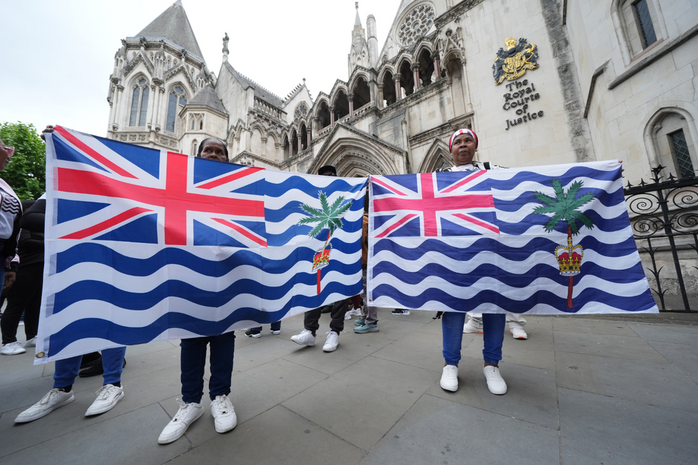 \u200bProtesters outside the High Court in central London