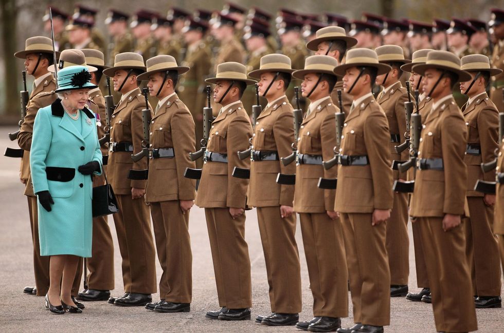 \u200bQueen Elizabeth II inspecting the Queen's Gurkha Engineers Attestation Party in 2011