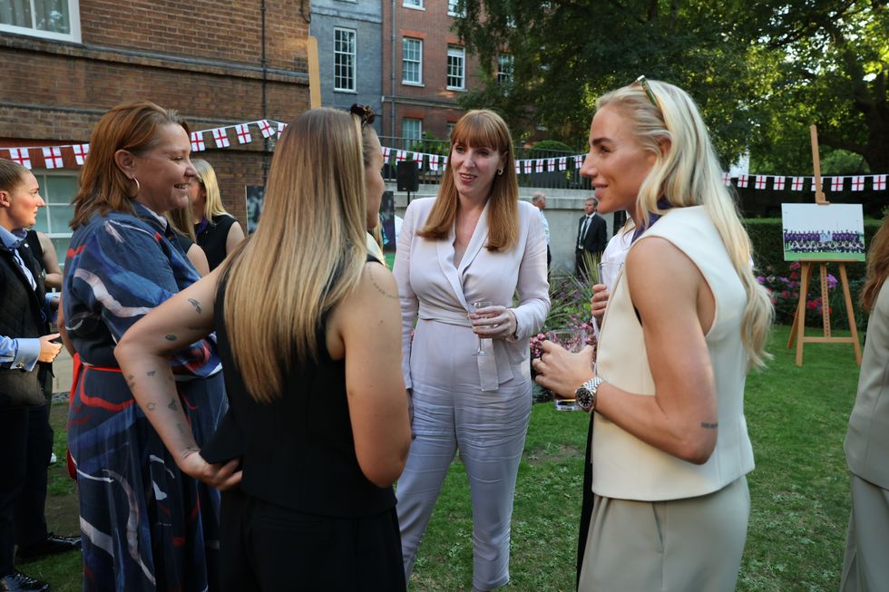 \u200bRayner pictured alongside players from the England Women's team