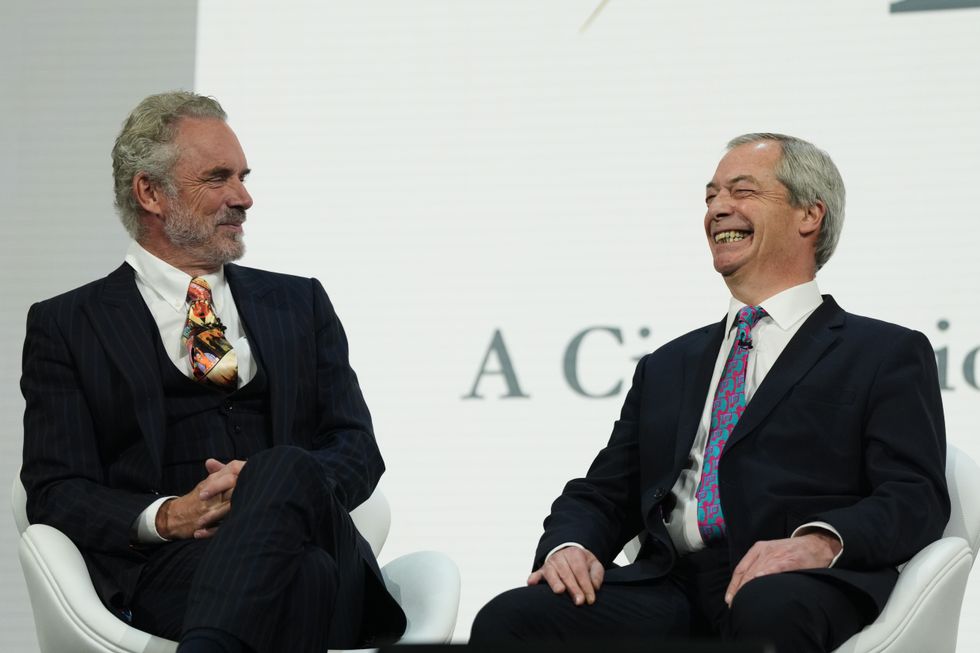 \u200bReform UK leader Nigel Farage (right) is interviewed by Jordan Peterson during the Alliance for Responsible Citizenship