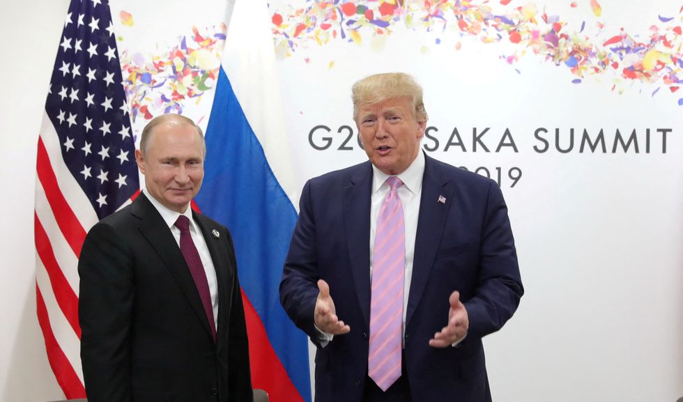 \u200bRussia's President Vladimir Putin and US President Donald Trump attend a meeting in 2019